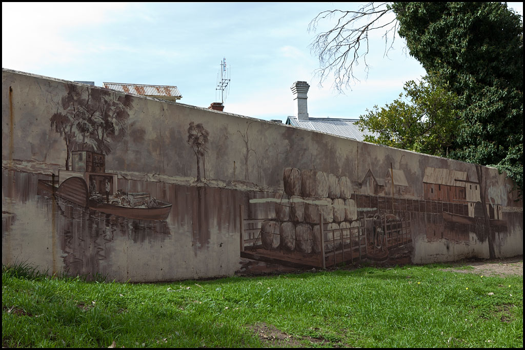 A mural on the levee bank wall.