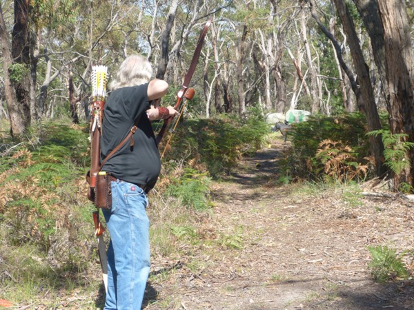 Tony Snushall about to let one fly from the Great plains recurve. Tony is wearing some fine leather gear