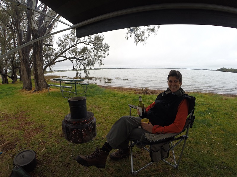 Pre dinner drinks with lake views. At a free camp site.