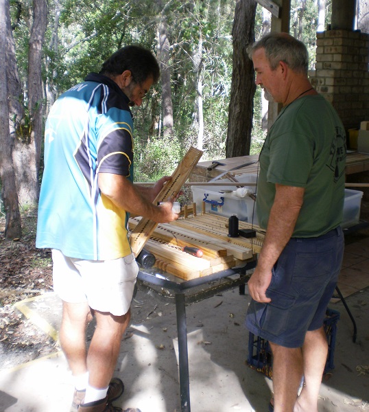 Gary showing John how to make a Flemish Twist String.JPG