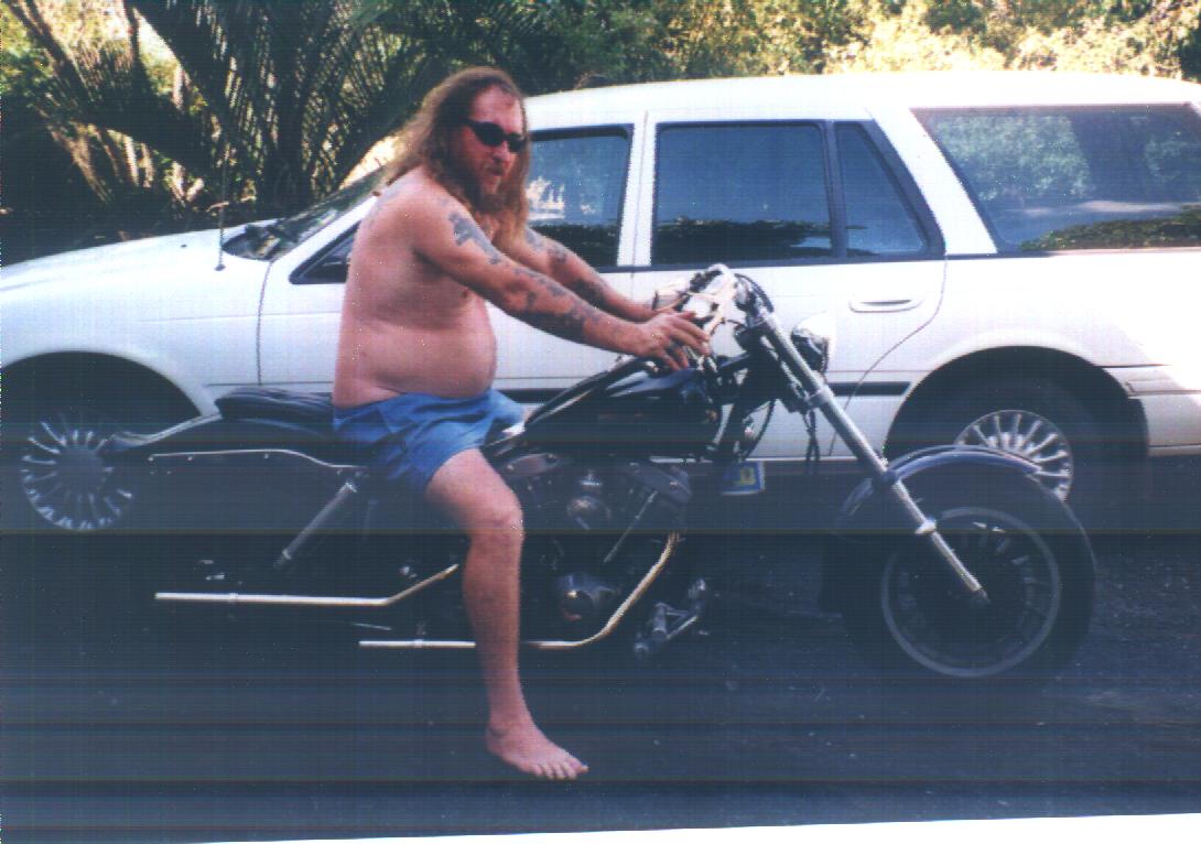 dad on the black bike.JPG